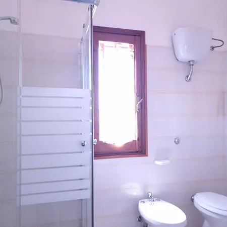 Lägenhet Residenze Lu Rinaggiu *